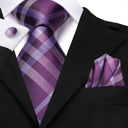 Purple plaid tie set styled with black suit and matching pocket square