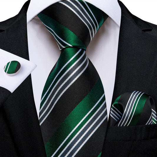 emerald green and black striped silk tie with white stripes styled with suit and cufflinks