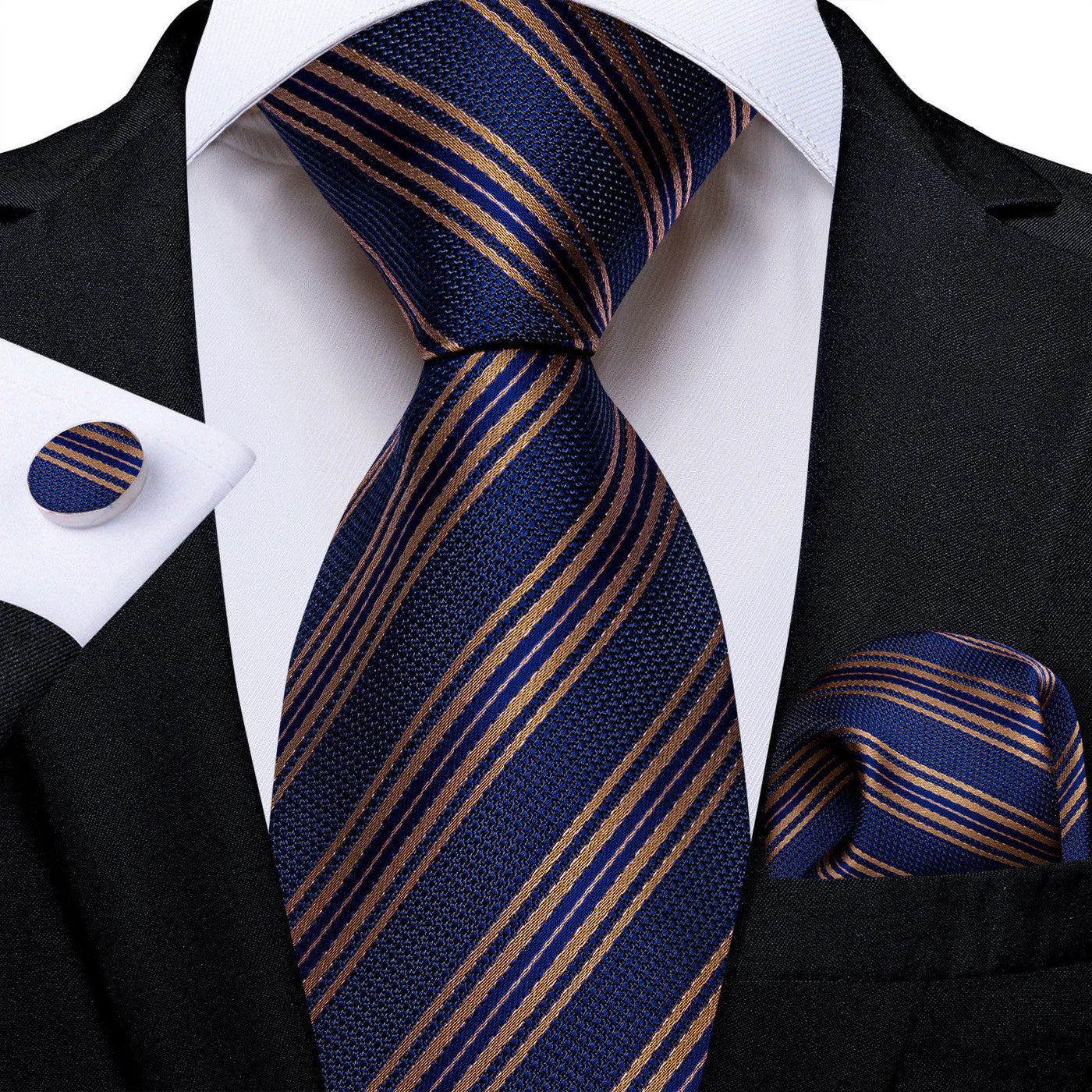 navy blue and gold striped silk tie styled with white shirt suit pocket square and cufflinks