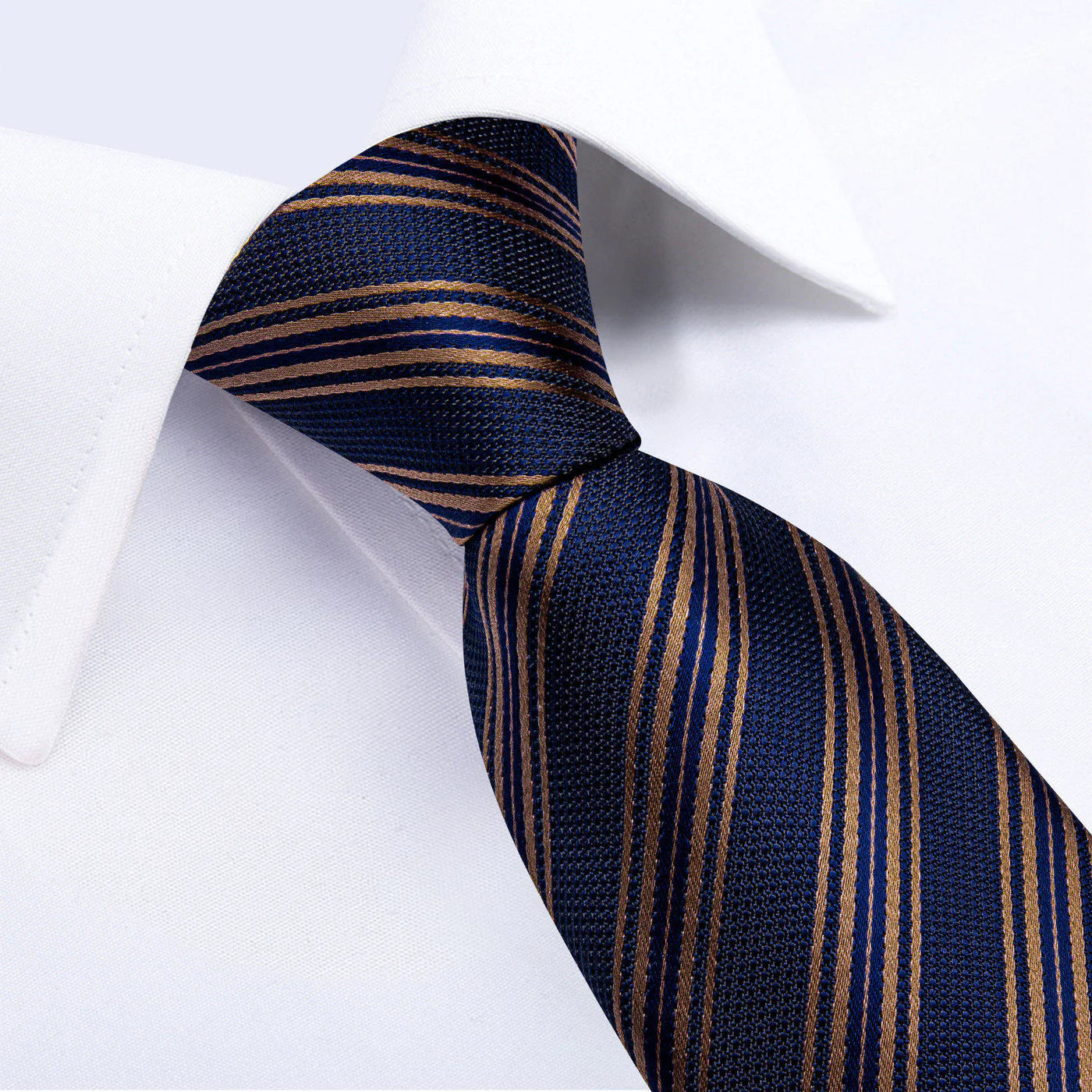 mens navy blue gold striped silk tie close up knot detail