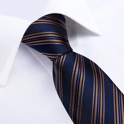 mens navy blue gold striped silk tie close up knot detail