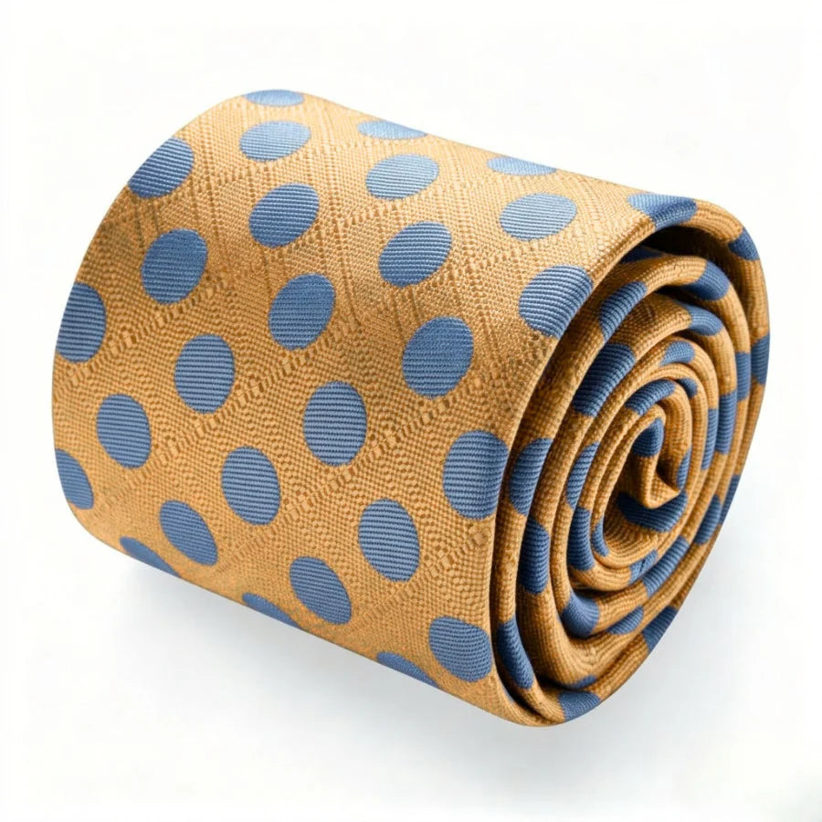 Rolled gold tie with light blue polka dot pattern and textured fabric