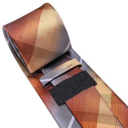 Close-up of rolled copper gray plaid silk tie showing back loop and woven texture