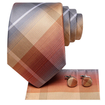 Copper and gray plaid silk tie set with pocket square and cufflinks on white background