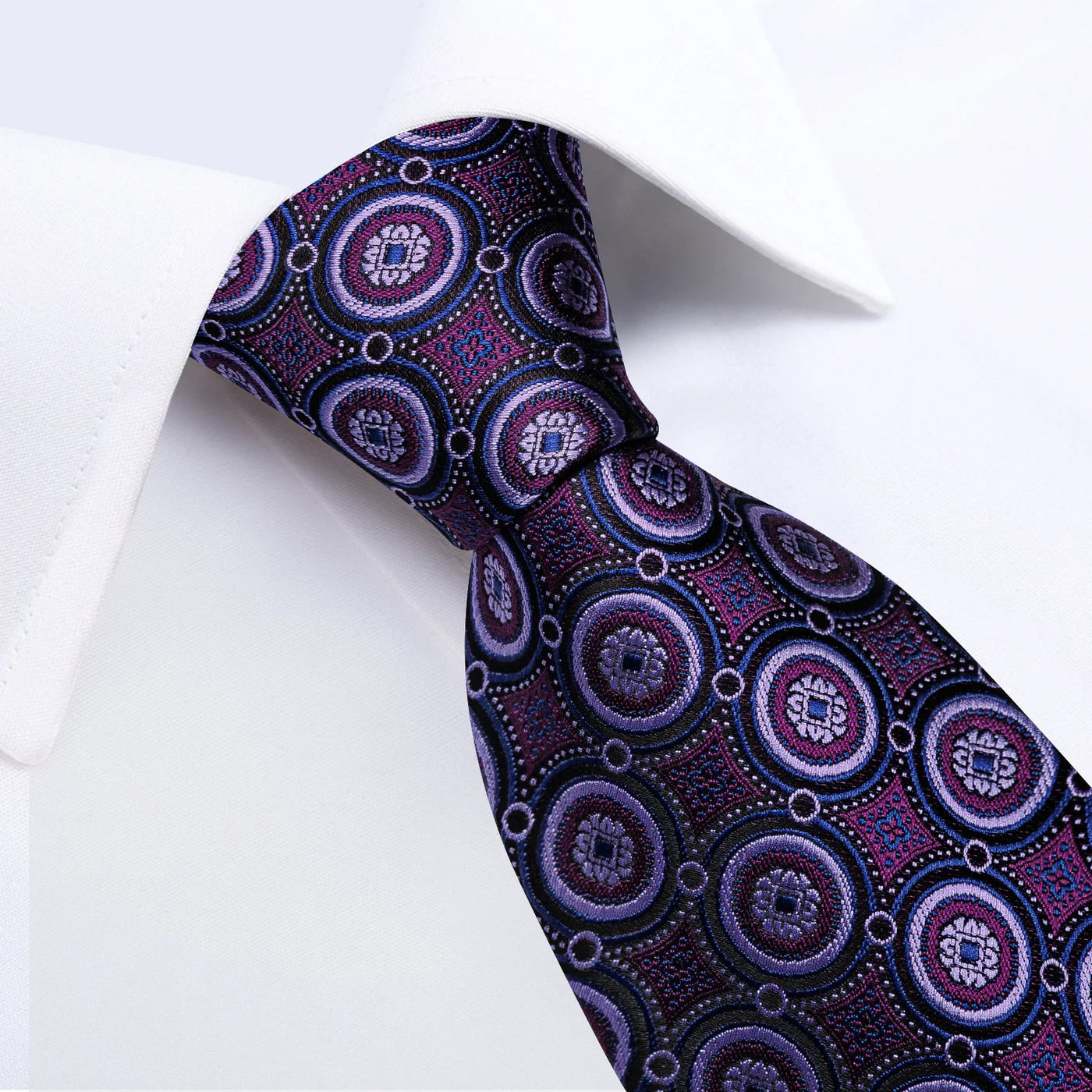 Close-up of purple medallion silk necktie with detailed woven pattern