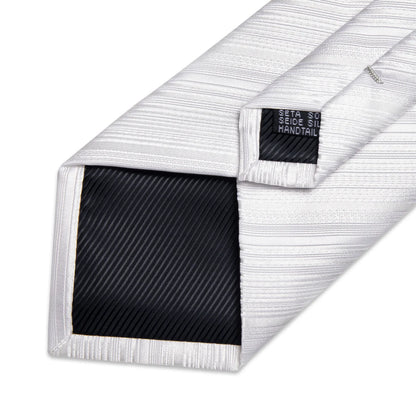 back view of white textured silk tie showing handmade finish and stitching