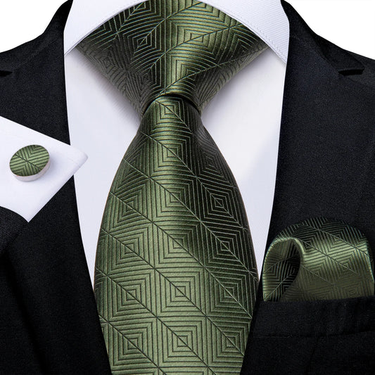 Dark green geometric silk tie set styled with matching pocket square and cufflink