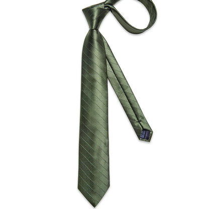 Full-length dark green geometric silk tie with woven square pattern