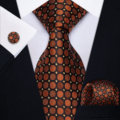 Brown geometric silk tie set styled with matching pocket square and cufflink