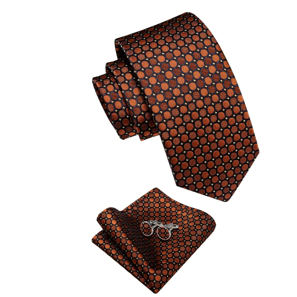 Brown geometric silk tie with matching pocket square and cufflinks on white background