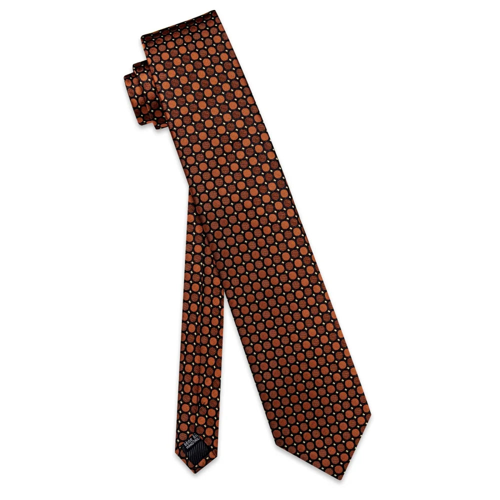 Full-length brown geometric silk tie with circular pattern on white background