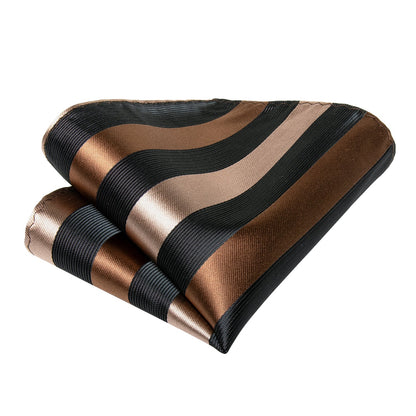 Matching pocket square from silver brown and black striped tie set folded in suit pocket